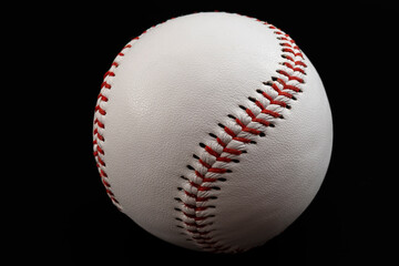 American sports, active hobbies and US culture concept with white leather baseball ball isolated on black background with clipping path cutout