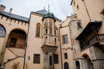 Kutna Hora, Central Bohemian, Czech Republic, 5 March 2022: Italian Courtyard or Vlassky dvur, medieval architecture gothic and renaissance, tower with lancet window and stained-glass windows