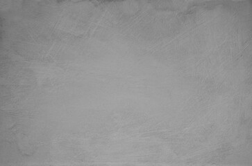 Dark gray scratched background. Old worn wall. Vintage. Surface. Backdrop. Presentation background. 
Texture with space for text.
