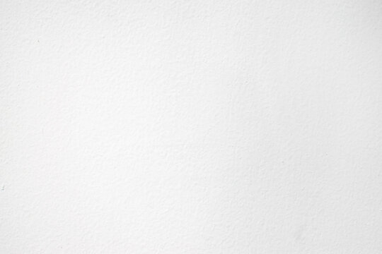 Abstract white grunge cement wall texture background.