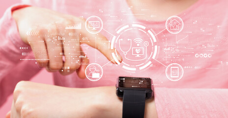 Telemedicine theme with woman pressing a smart watch