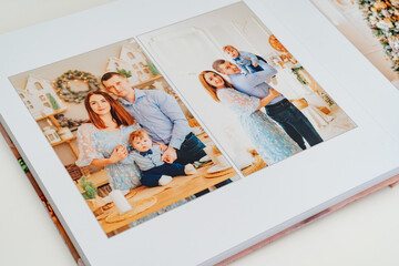 page of Photobook with photos of family photo shoot.