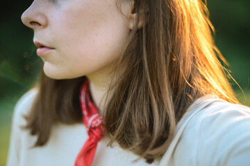 Portrait of  young woman  in field