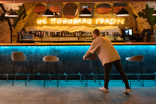 Barman preparing bar for opening