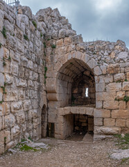 Fototapeta na wymiar Interior view of a restored Room beneath the ruined Southwestern Tower in Nimrod fortress , located in Northern Golan, at southern slope of Mount Hermon, the biggest Crusader-era castle in Israel. 