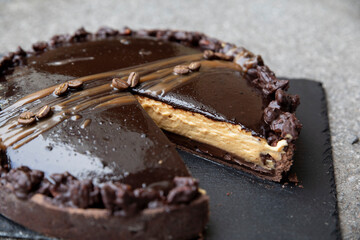 Chocolate espresso tart with mousse and glaze, homemade