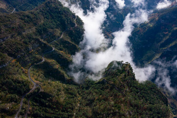 View into the valley of nuns in Madeira, Portugal. Mountains with dramatic clouds. 
