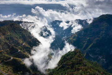 View into the valley of nuns in Madeira, Portugal. Mountains with dramatic clouds. 