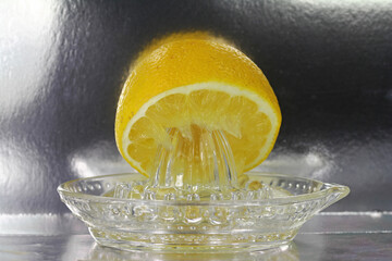 Lemon with press from glass squeeze