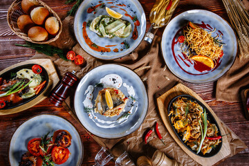 Frying pan, mashed potatoes, fish and meat. Collection of Ukrainian dishes