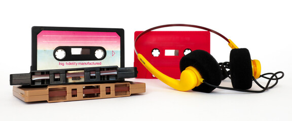 Vintage Cassette tape and headphones isolated on a white background