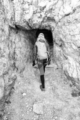 Young woman on the via ferrata Innerkofler De Luca in Sexten Dolomites, South Tyrol, Italy, Europe