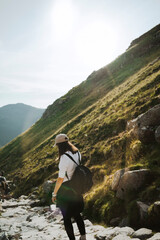 Naklejka na ściany i meble hiker in the mountains Ben Nevis Scotland
