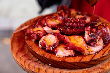 Portion of Pulpo a Feira, octopus cooked with olive oil and paprika. Typical recipe of the Spanish...