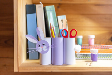 DIY hare or rabbit or bunny toy, handmade pencil holder, toilet paper roll craft concept for kid...
