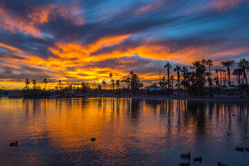 Fototapeta na wymiar Dramatic vibrant sunset scenery at Lake Havasu, Arizona