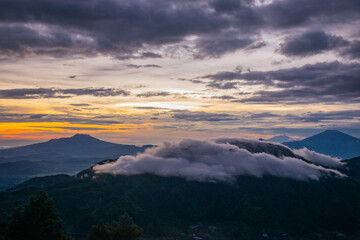 colorful sunrise at the highest peak of Mount Si Kunir, Mount Dieng, Wonosobo, Indonesia 
