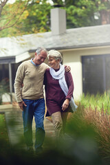 Their relationship is stronger than ever. Shot of a loving senior couple taking a walk outside.
