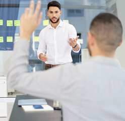 Yes, you have something to say. Shot of a young businessman leading a discussion during a meeting...