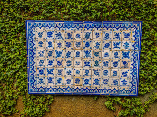 Decorative wall of tiles in Madeira island. In Monte Palace botanical garden in Funchal, Madeira
