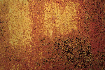 Rough old yellow orange brown texture. Painted metal surface. Rusty iron background with space for design. Cracked peeling paint. Weathered, damaged, scratched. 