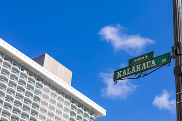 Kalakaua Avenue Road Sign in Waikiki, Hawaii, USA. Selective focus.