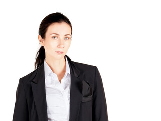 Young cauasian business woman in white shirt and black suit standing in a white photography scene. Portrait on white background with studio light.