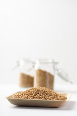 Whole wheat seedl on white background. Natural product, healthy baking ingredient