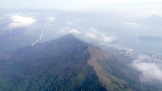 epic aerial view of Pat Sin Leng, Flying through the cloud across Mountain landscape