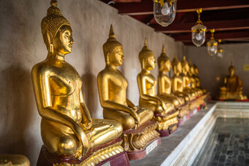 Old Beautiful Golden Buddha Many statues at Wat Phra Si Rattana Mahathat also colloquially referred to as Wat Yai is a Buddhist temple It is a major tourist is Public places in Phitsanulok,Thailand.