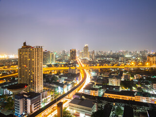 Fototapeta na wymiar High angle view of Bangkok, an urban area with sky train tracks