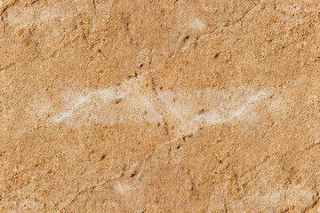 Sandy textured brown color rough concrete wall surface for texture background