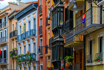 Colorful house facades in Pamplona Spain, town famous for bull running