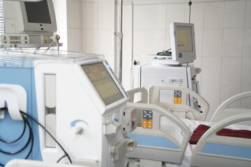 Almaty, Kazakhstan - 06.18.2021 : The doctor sets up the equipment in the intensive care unit