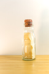 glass bottle with paper in it