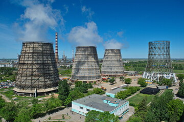 Pavlodar, Kazakhstan - 05.29.2015 : Cooling towers and pipes of various compartments of a large...