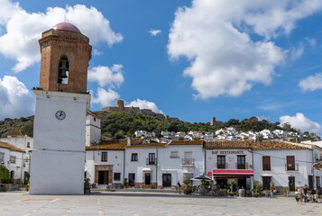 view of the Plaza de la Constitucion Square and Campanario Tower in downtown Jimena de la Frontera