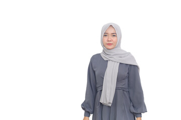 Beautiful asian muslim woman standing against white background