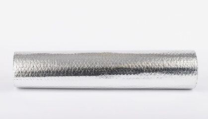 silver thermal insulation material stands on a white background.