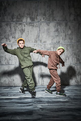 Fototapeta na wymiar two dancing boys