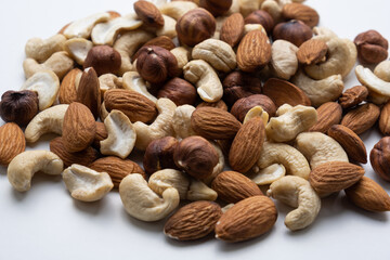Various nuts on a white background close-up.