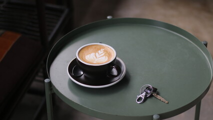 Coffee latte close up on rustic wood table