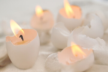 Fototapeta na wymiar Easter eggs-candles with over eggs