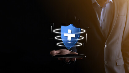 Businessman hold Shield with plus Low polygonal icon, medicine icon.Health shield.Medical logo template,protection symbol with cross sign, healthcare security label,Medical logo,life insurance service