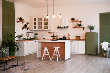 Modern Kitchen Interior with Island, Sink, Cabinets, and Big Window in New Luxury Home.