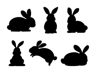 Silhouettes of easter rabbits isolated on a white background. Collection of bunnies flat cartoon.