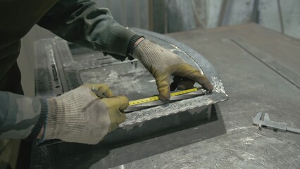 Forge workshop on table. Smithy manual production. Work on the product. Ruler, angle grinder. The...