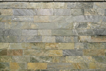 モノトーンの模様のある組み石の石塀