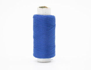blue yarn on spool, yarn on tube, cotton, wool, linen thread, isolate on white background