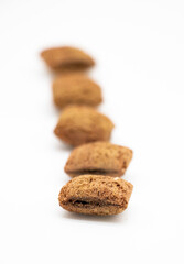 close-up chocolate chips isolated on white background